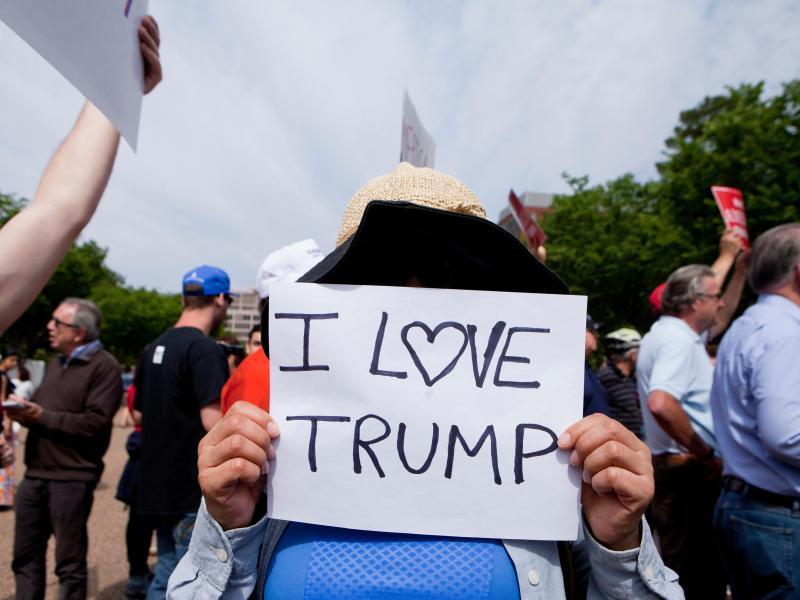 Paper sign reading I Love Trump